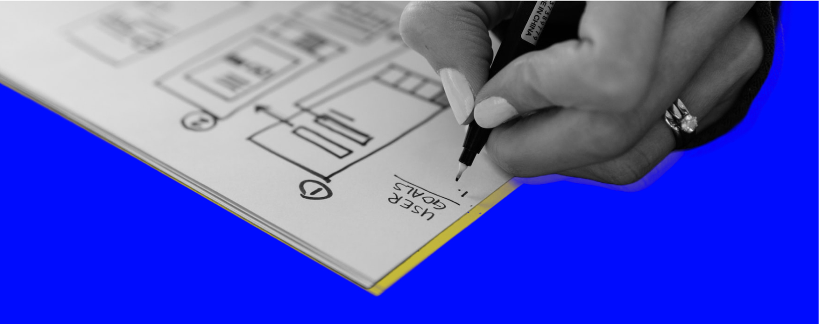 A researcher reviewing user research notes