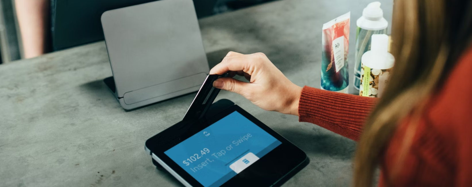 A shopper comparing loyalty program options